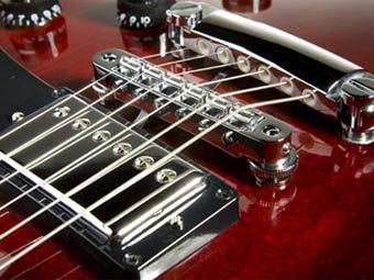 Бридж гитары с системой Tronical. Изображение с сайта engadget.com.