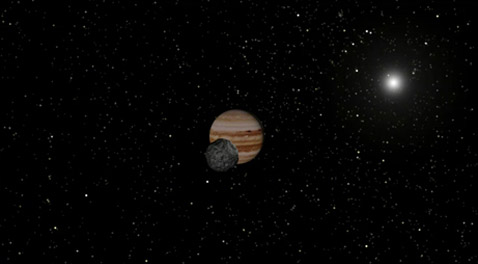 Wild 2 с Юпитером и Солнцем на заднем плане. Период обращения этой кометы по вытянутой орбите составляет немногим менее шести с половиной лет (иллюстрация NASA).